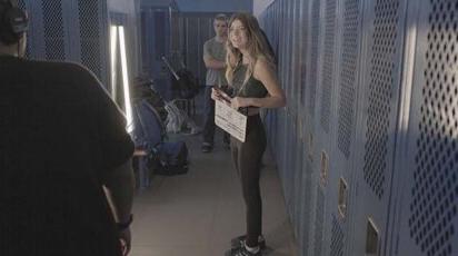 Sadie Schoenberger '25 on set in locker room